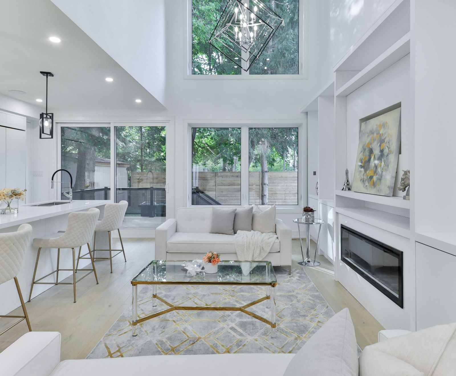 Bright white living room with a double-height ceiling